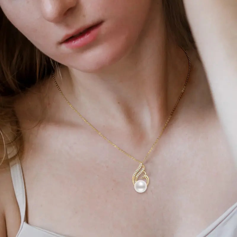 Close-up Lifestyle View of Gold-Wrapped Swan Pearl Necklace