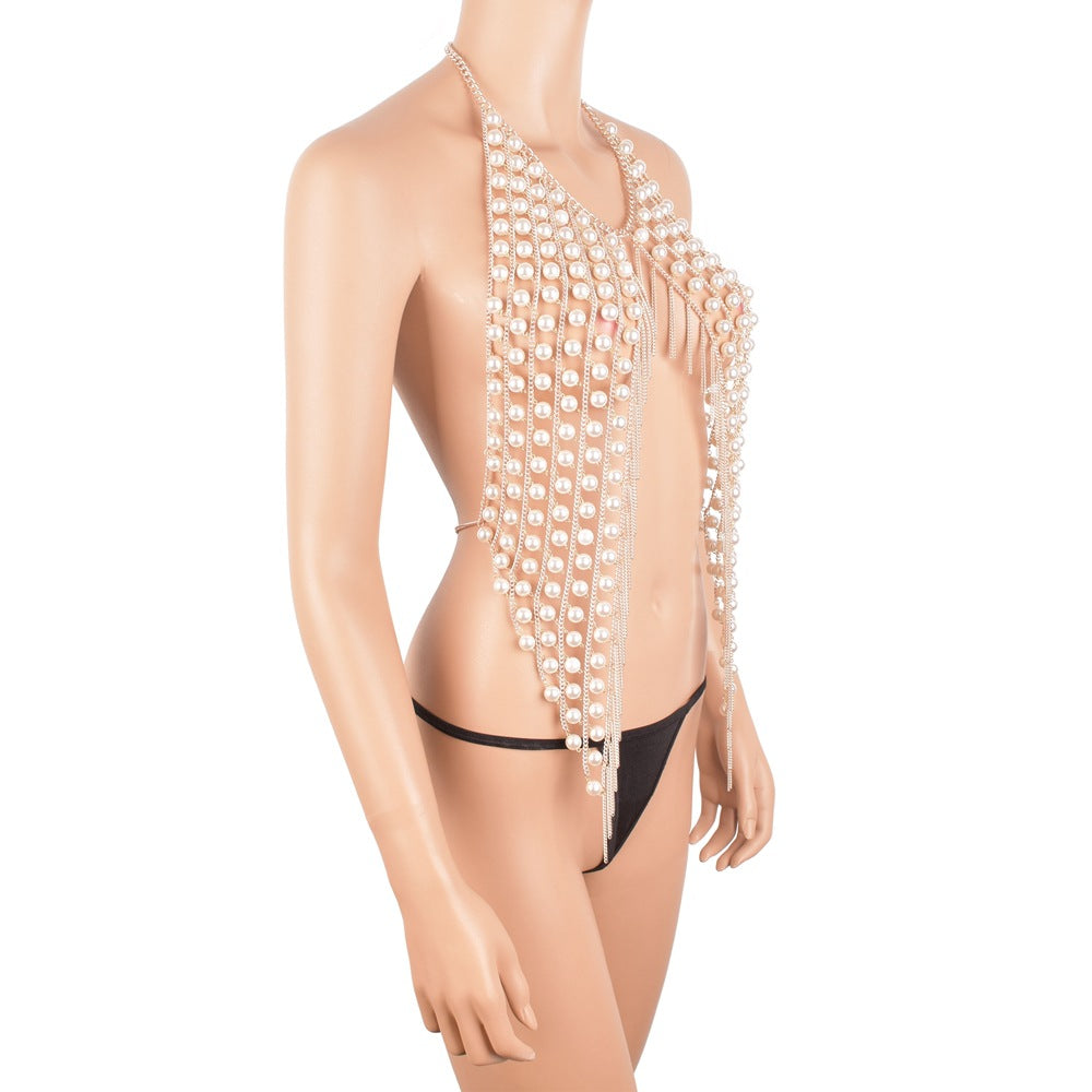 Elegant pearl body harness jewelry displayed on a mannequin