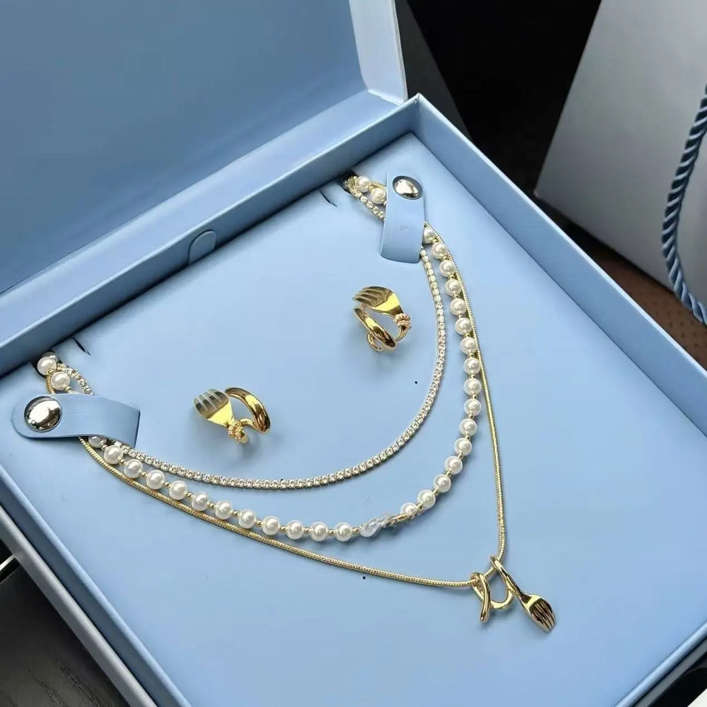 Layered Pearl Pendant Necklace – Three-Layer Gold Chain Pretty in Pearls