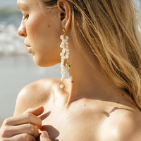 Korean style Baroque Freshwater Pearl Conch Drop Earrings modeled close-up on woman