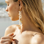 Korean style Baroque Freshwater Pearl Conch Drop Earrings modeled close-up on woman