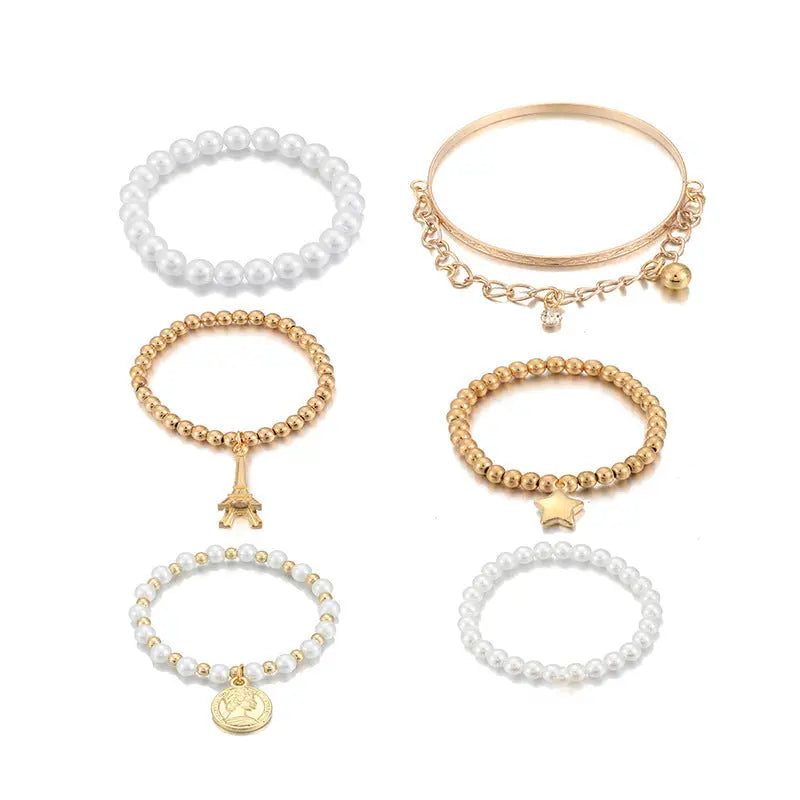 Vintage Gold Layered Pearl Charm Bracelet Stack - Six-Piece Set with Eiffel Tower and Coin Charms eprolo
