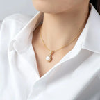 Model wearing 14K Gold-Wrapped Teardrop Pearl Choker