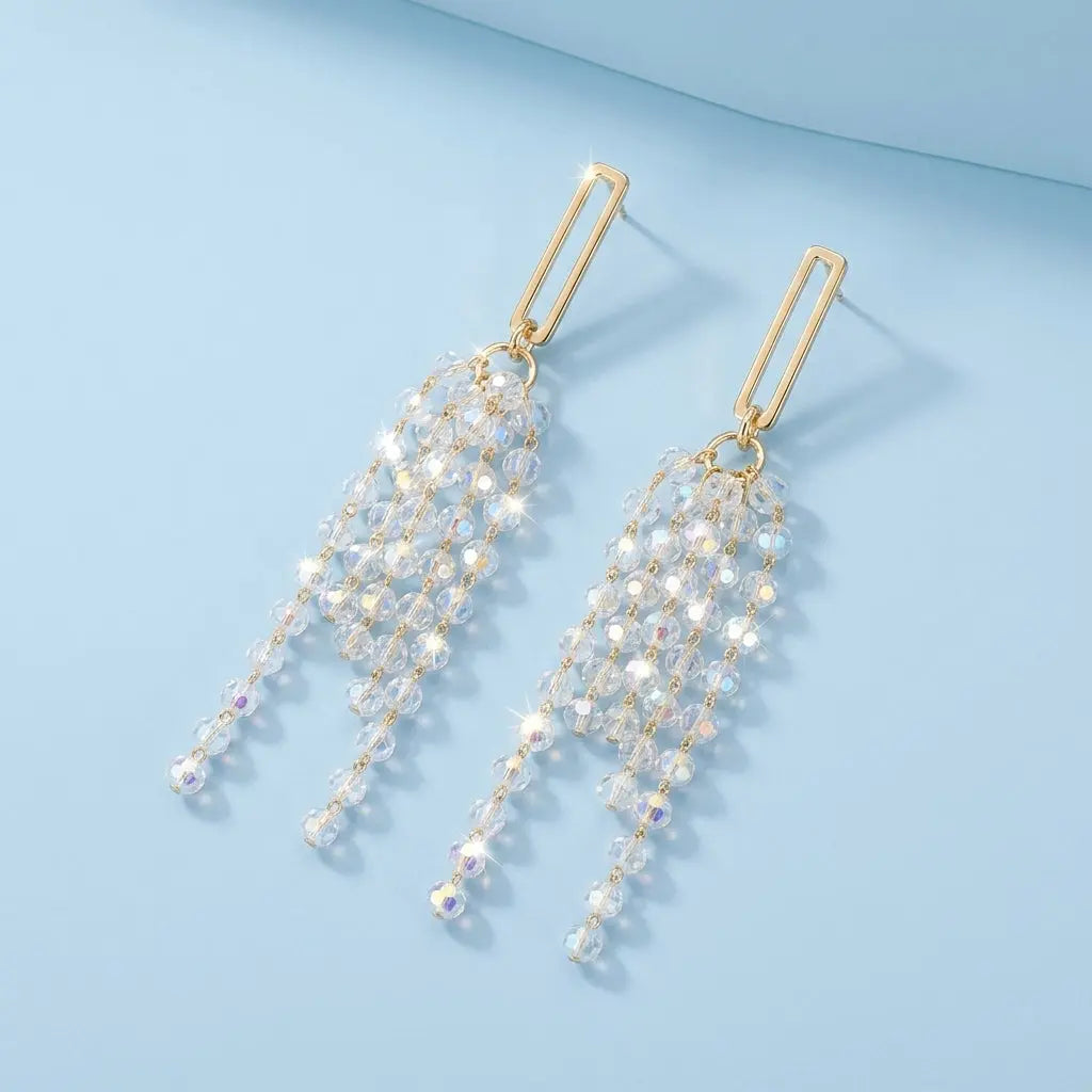 Style E0120 Elegant Crystal Cascade Earring on a light blue studio background