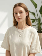 Elegant model wearing Double Layer Pearl Pendant Necklace