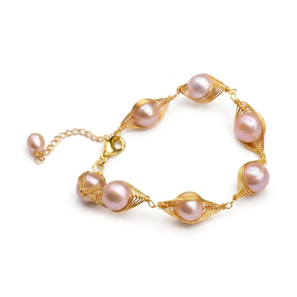 Handmade Natural Pink Freshwater Pearl Gold Wire Wrapped Bracelet on White Background